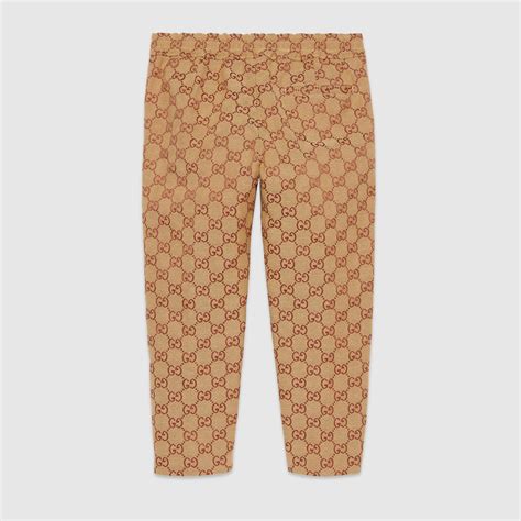 pantaloni gucci uomo con logo|Gucci Pantalone in tessuto GG con GG in pelle.